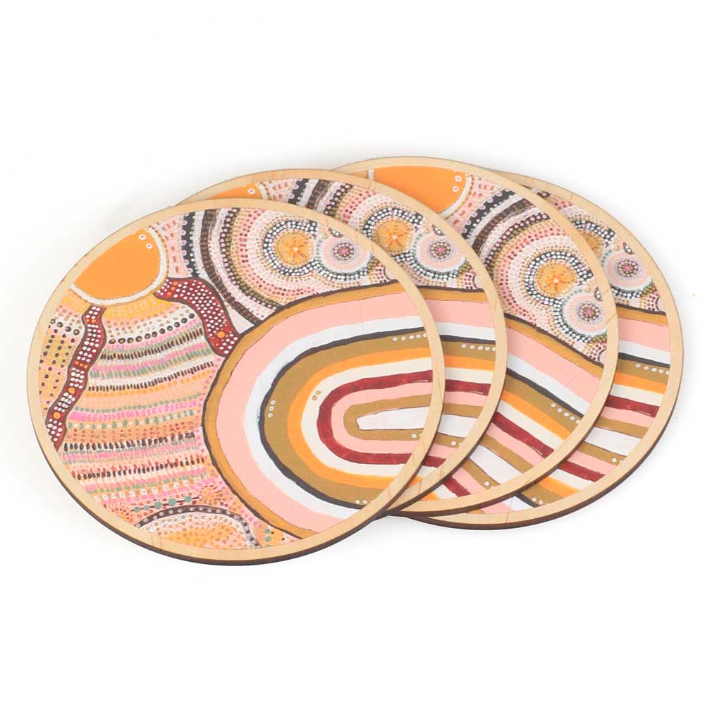 Journeys in the sun artwork on wooden coasters. Artist: Jacinta-Rai Ridgeway-Maahs Australian Museum shop online