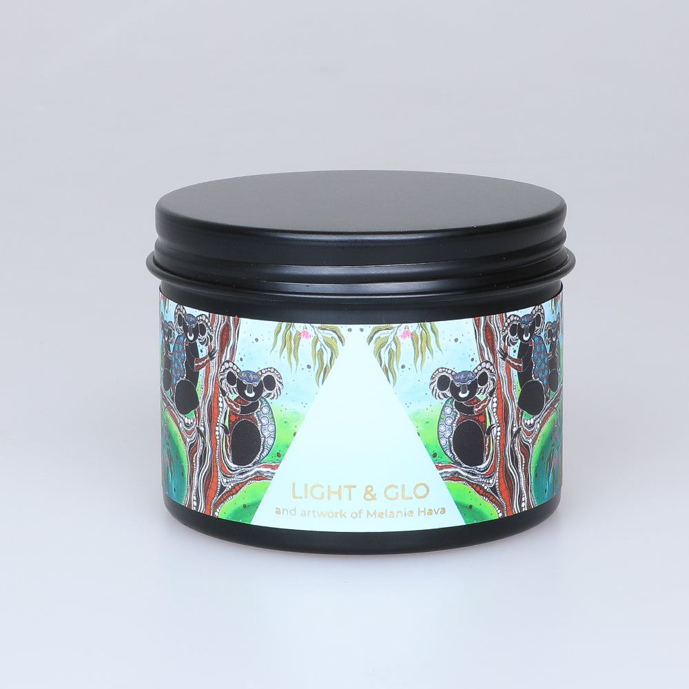 Fragrant soy wax candle in travel tin with artwork by first nations artist Melanie Hava. Australian Museum Shop online