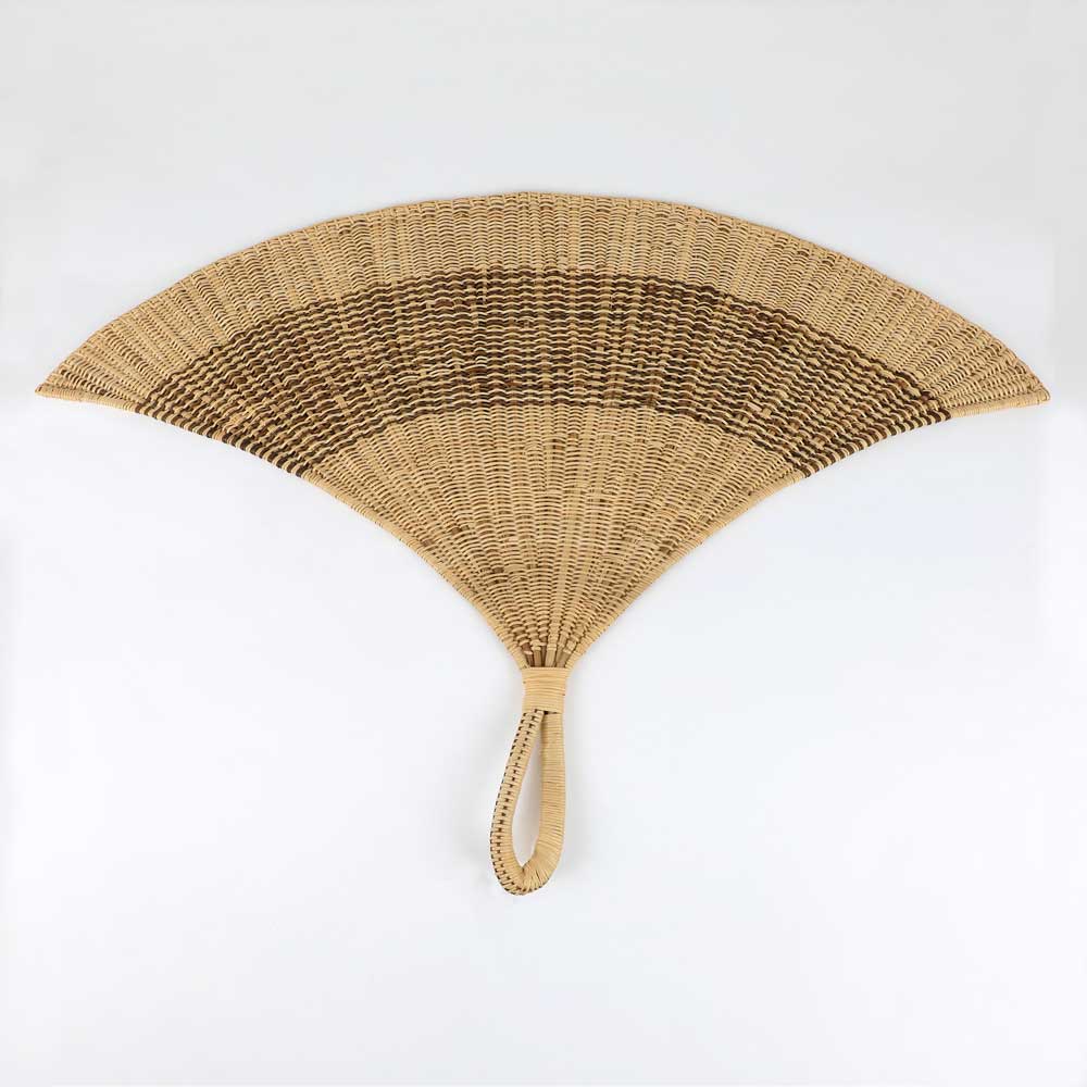 Handwoven fan from Vanuatu on white background