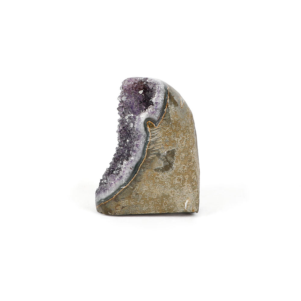 Amethyst crystal cluster scuplture on a white background. Side view