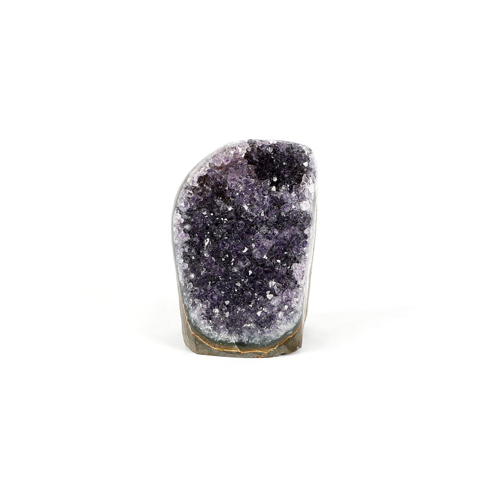 Amethyst crystal cluster scuplture on a white background
