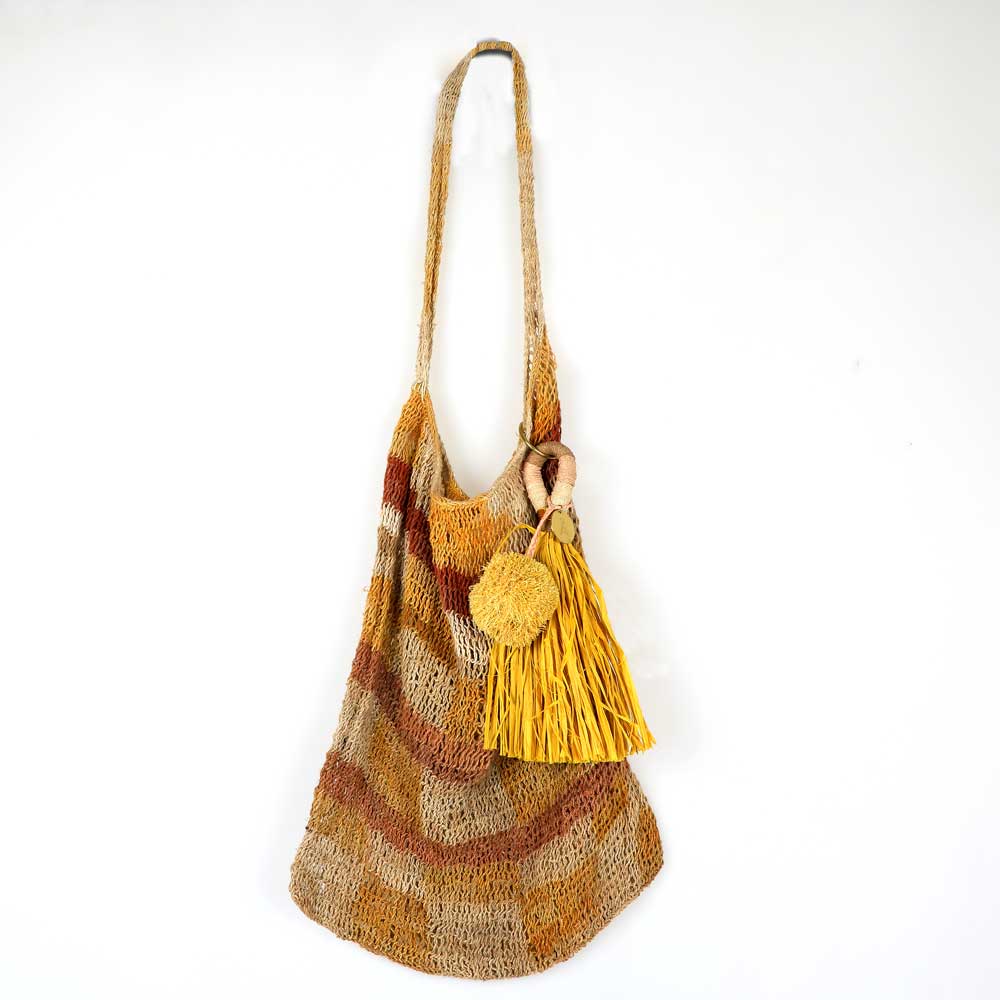 Sepik Bilum bag with sisal pom and tassel. Australian Museum Shop online