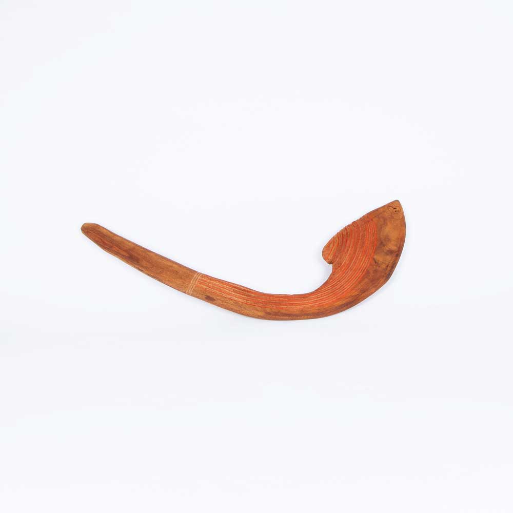 Andy Snelgar handcarved throwing club on white background for Australian Museum Shop Online