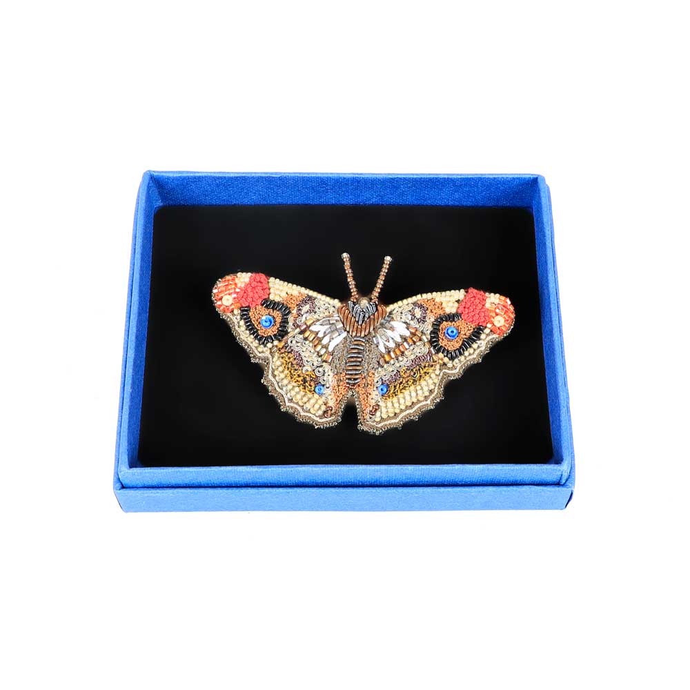 Trovelore Beaded nature brooch hand made in india on white background. Apatura Iris Butterfly