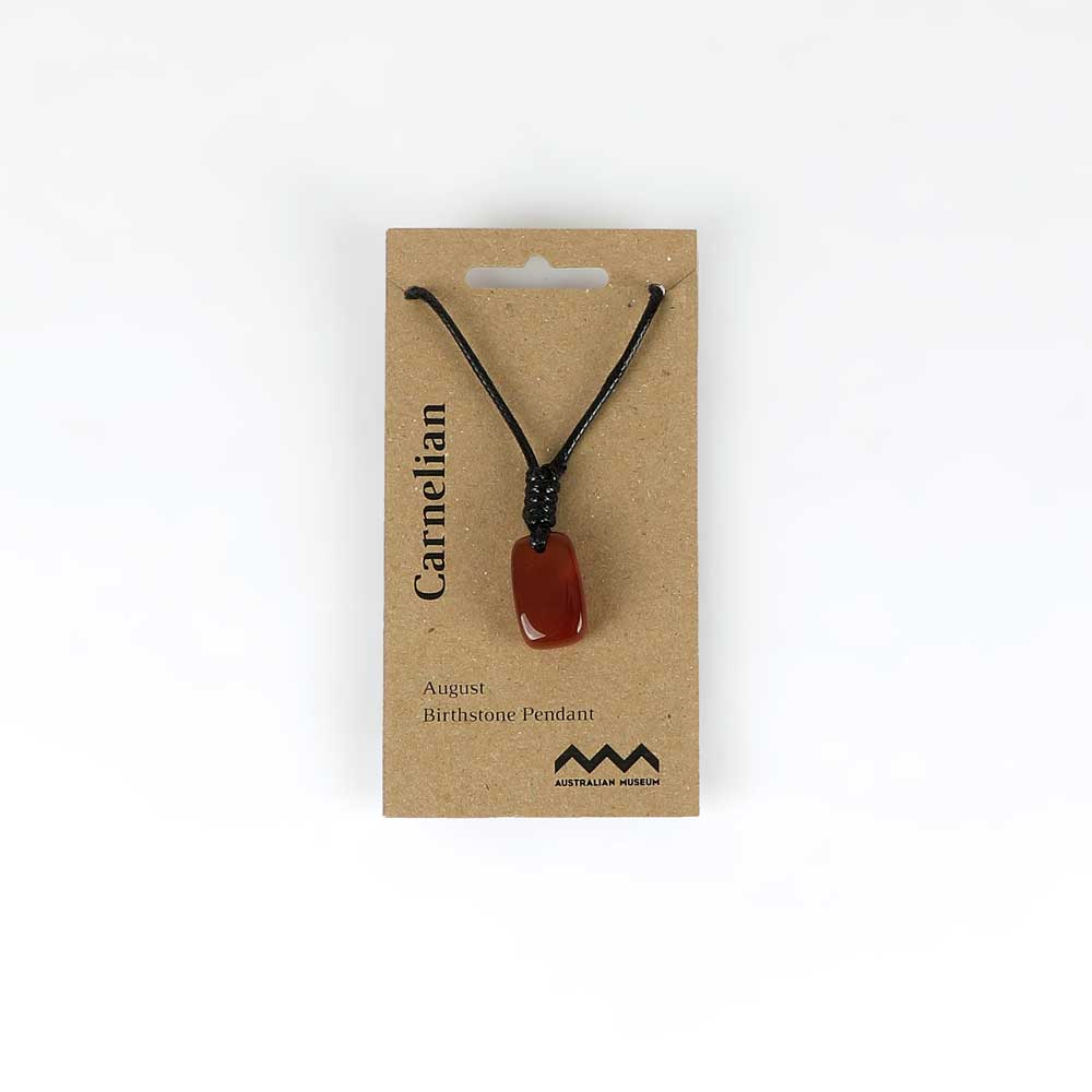 August birthstone pendant on leather and fibre necklace on white background for Australian Museum Shop online