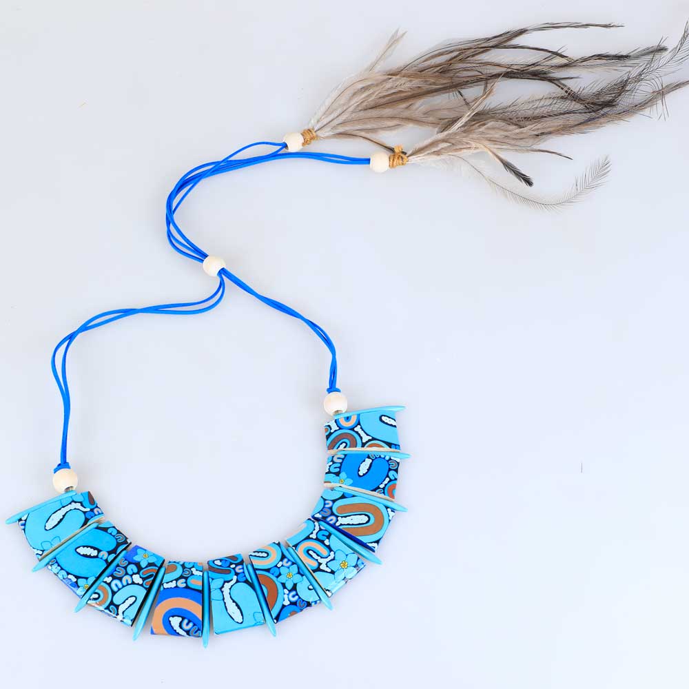 Autism leaves imprints necklace made through a collaboration between Barkandji artists Cleonie Quayle and Kimberley Mann. Australian Museum Shop online