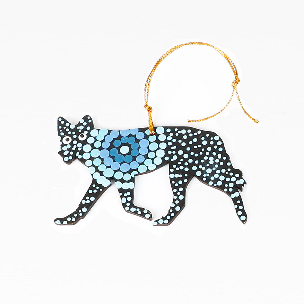 Handpainted desert dog ornaments from Warlukurlangu artists cooperative on white background