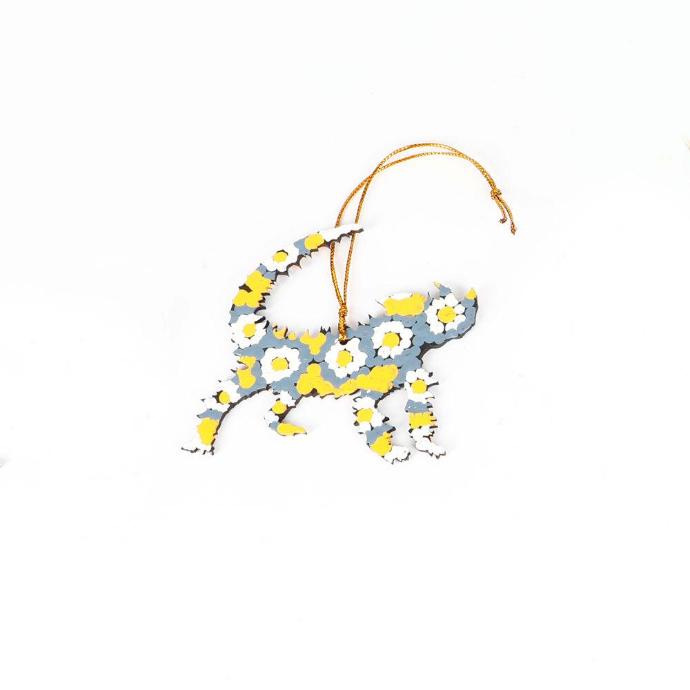 Decorative thorny devil ornament handpainted by Warlukurlangu Artists, on a white background