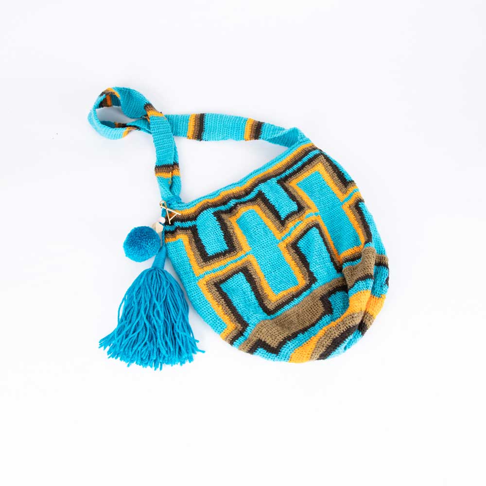 Blue and yellow geometric design bilum bag handwoven by Alma Joel. Photographed on white background