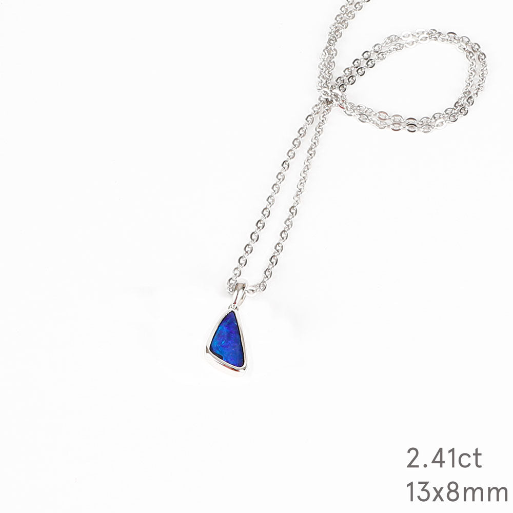 Deep Blue Australian Boulder Opal pendant Necklace with sterling chain on a white background