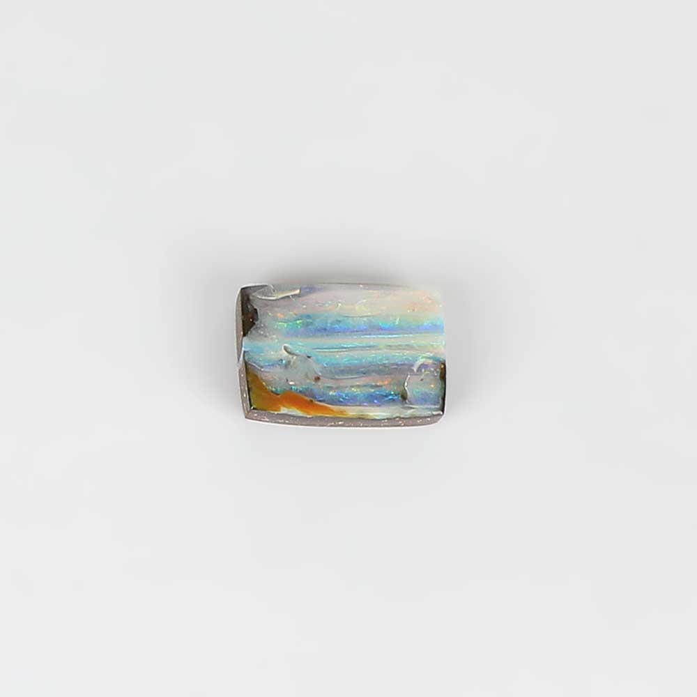 Boulder opal specimen on white background