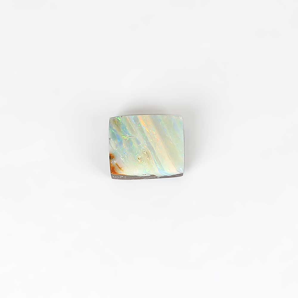 Boulder opal specimen on white background