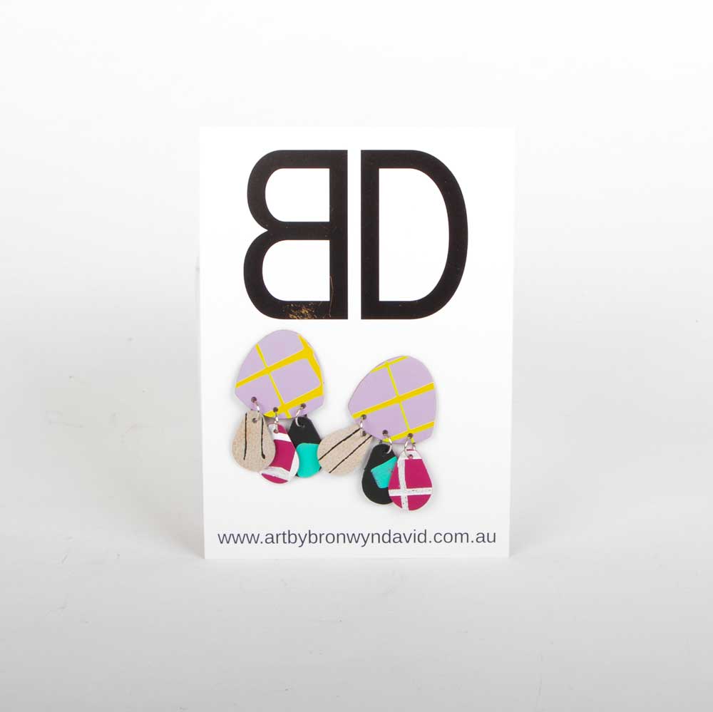 Bronwyn David handmade hand painted leather earrings with surgical steel stud on white background