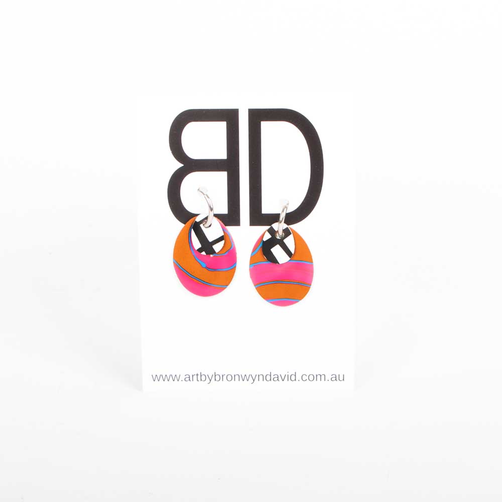 Bronwyn David handmade hand painted leather earrings with surgical steel hoops on white background