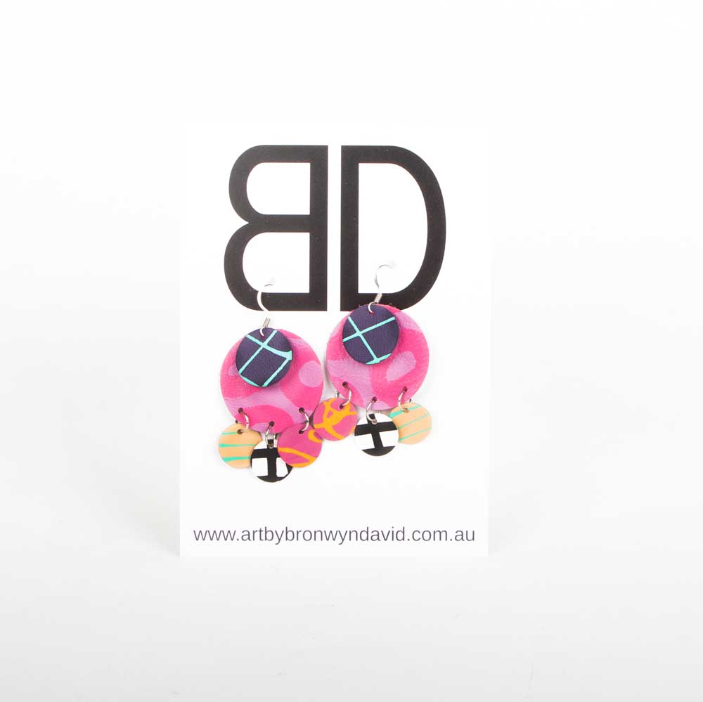 Bronwyn David handmade hand painted leather earrings with surgical steel hooks on white background