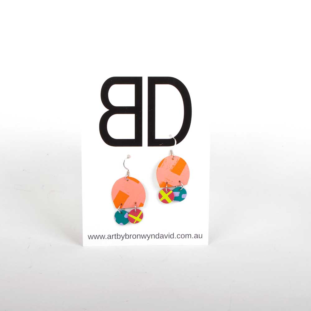 Bronwyn David handmade hand painted leather earrings with surgical steel hooks on white background