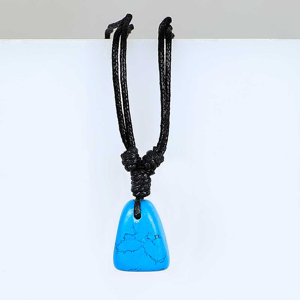DEcember birthstone pendant on leather and fibre necklace on white background for Australian Museum Shop online