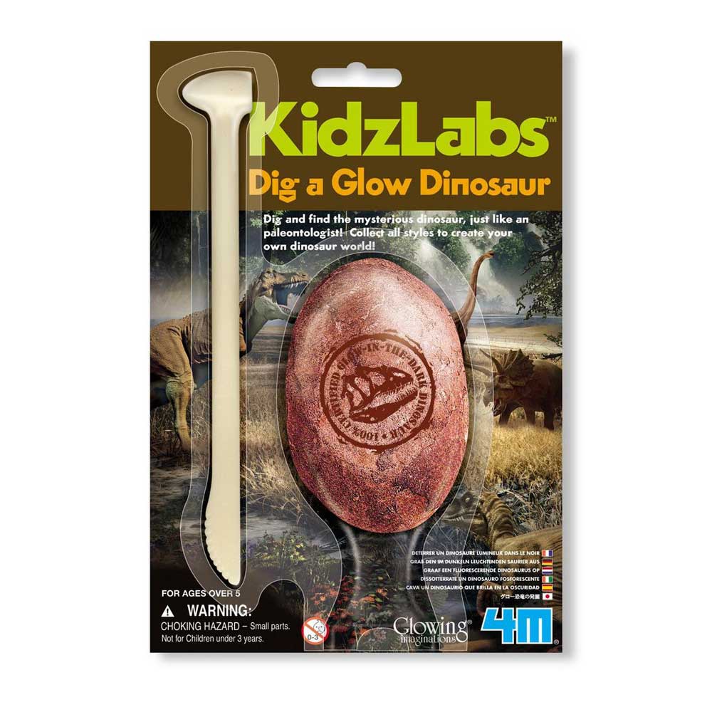 Dig a glowing dinosaur kit with excavation tool, plaster egg and glowing dinosaur model. photographed against white background. australian Museum shop online