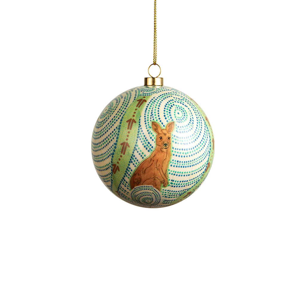 Kangaroo tracks of roaming decorative bauble on white background