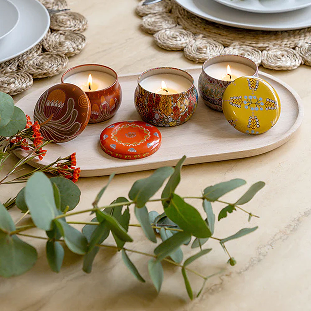 Dreamtime blooms scented candle tin in table setting
