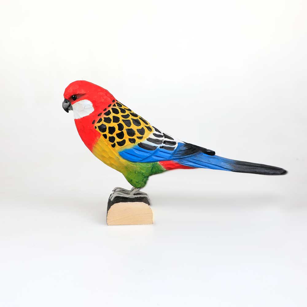 Eastern Rosella hand carved linden wood deco bird photographed against white background. Australian Museum Shop online