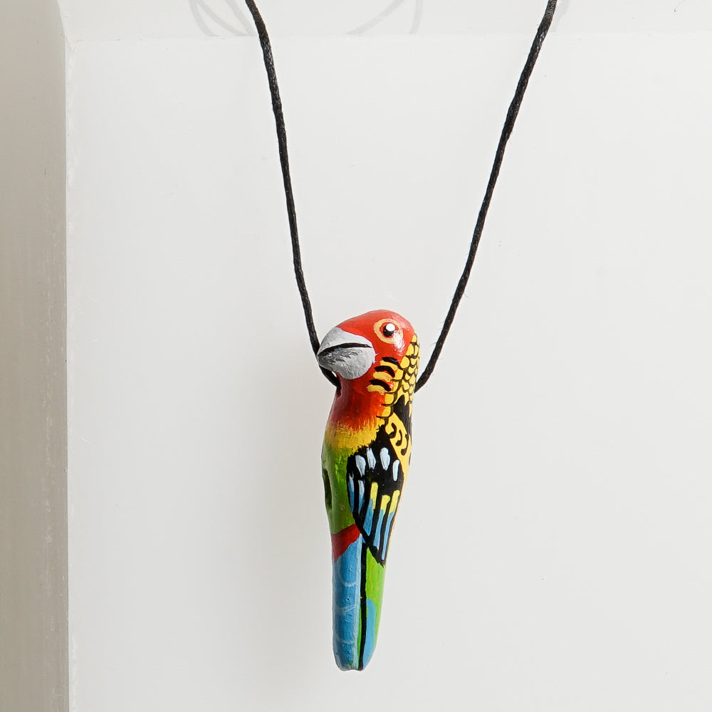 Bird Whistle Necklace hand made hand painted on white background