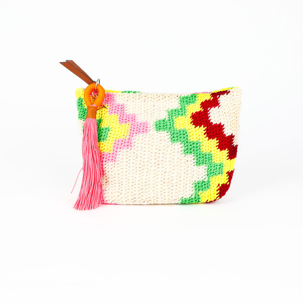Colorful Florence Mountain hand woven Bilum bag with geometric pattern, zip closure and orange and pink tassel, reverse view, on a white background