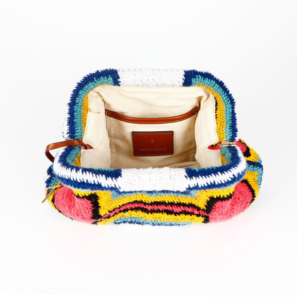 Colorful Florence Skin Pik hand woven Bilum bag with geometric pattern, interior view, on a white background