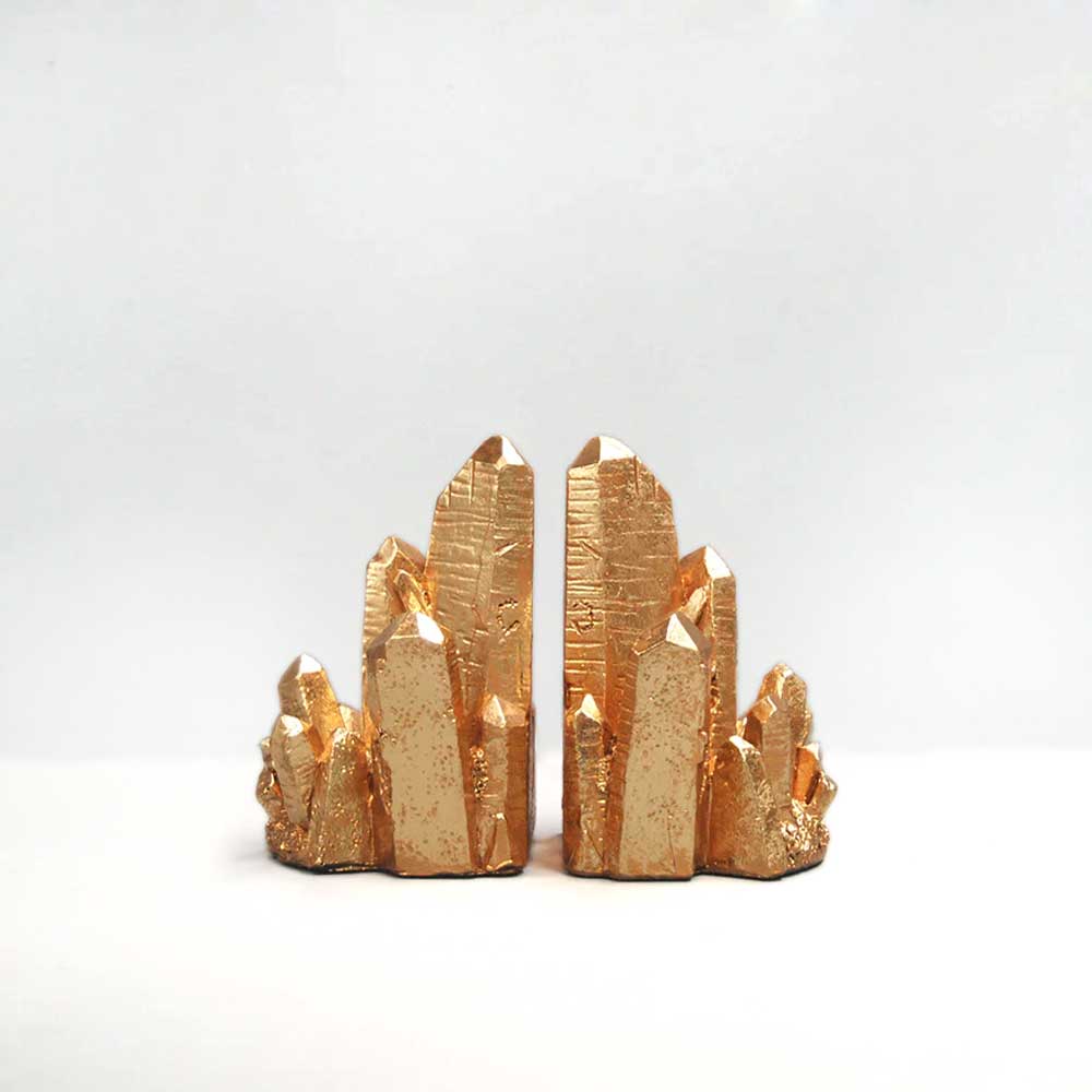 Geo bookends in gold. White Moose designs, photographed on white background for Australian Museum shop online