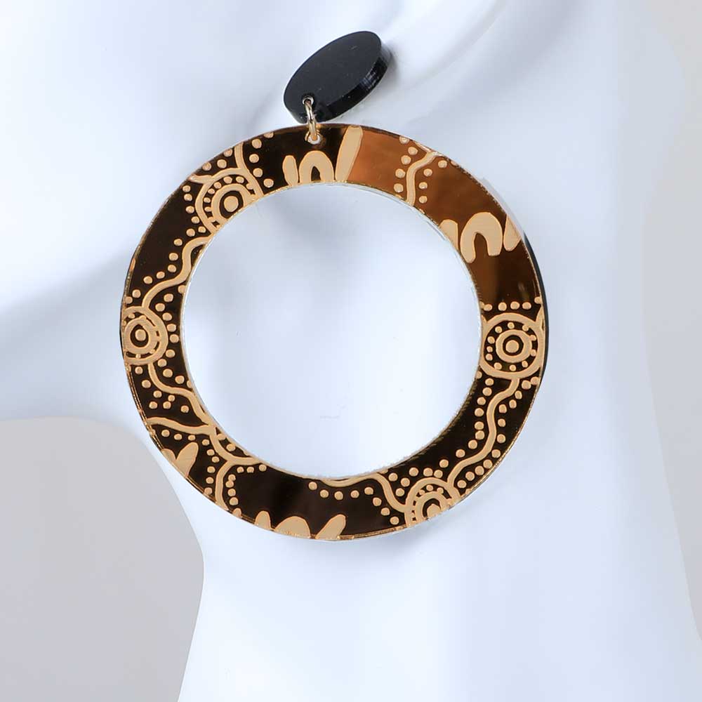 Gold wiradjuri mirrored hoop earrings. Haus of dizzy. photographed on white background for the Australian Museum shop online
