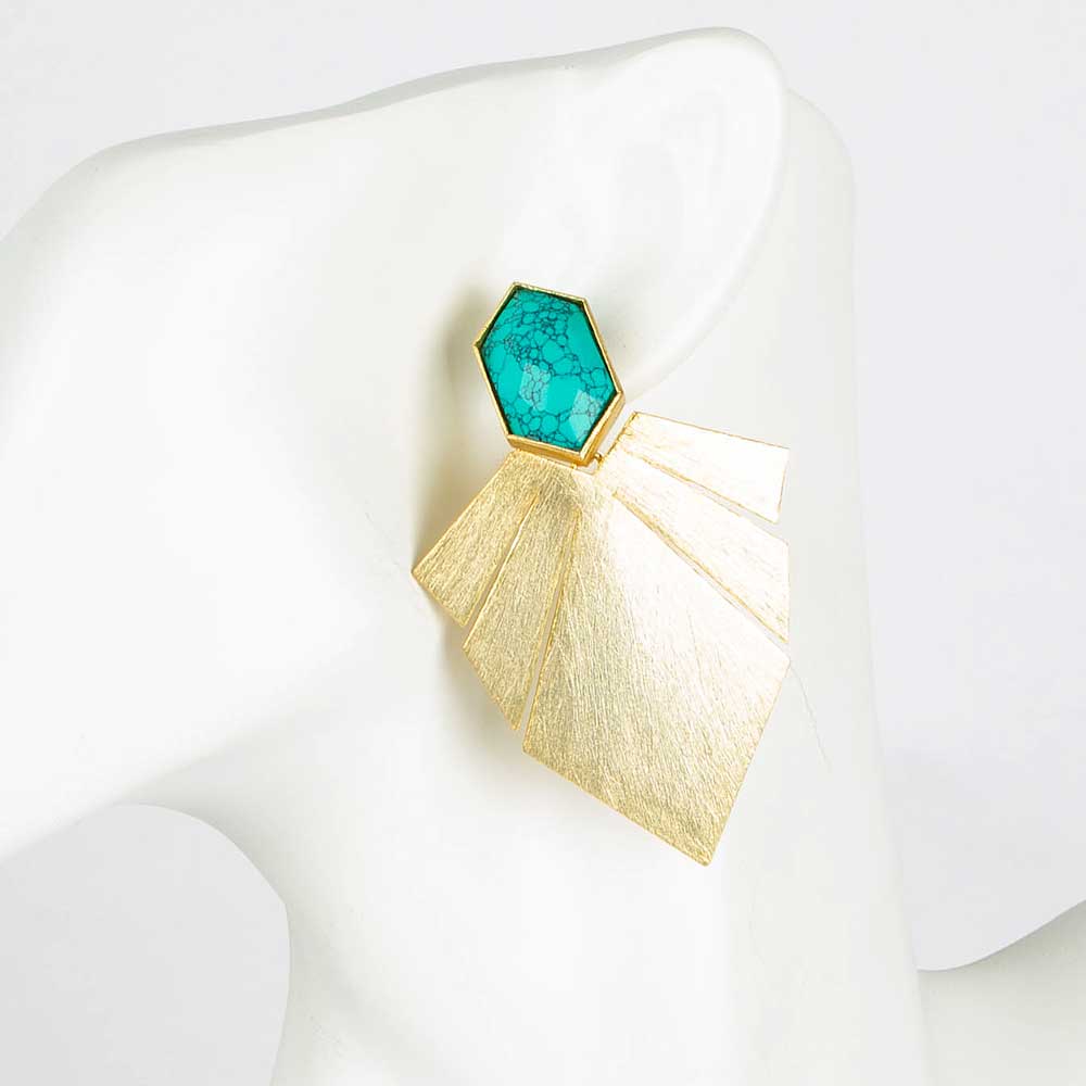 Gold fan earrings with turquoise detail on white mannequin and background