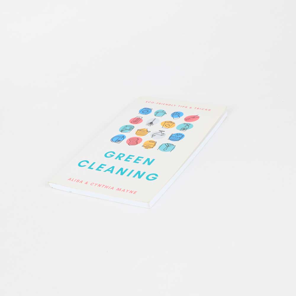 Green cleaning book on white background