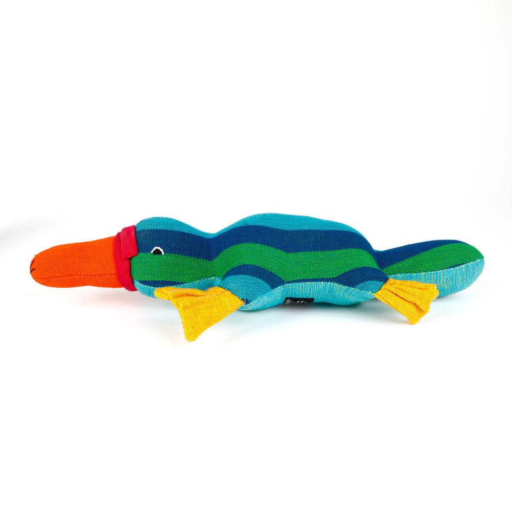 Colorful green striped platypus hand made from handwoven fabric by Barefoot Toys on a white background