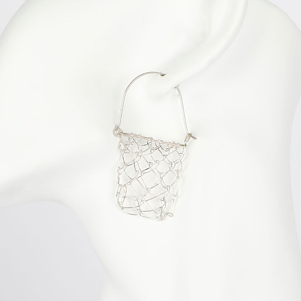 Silver Handwoven string bag Earrings on white mannequin background 