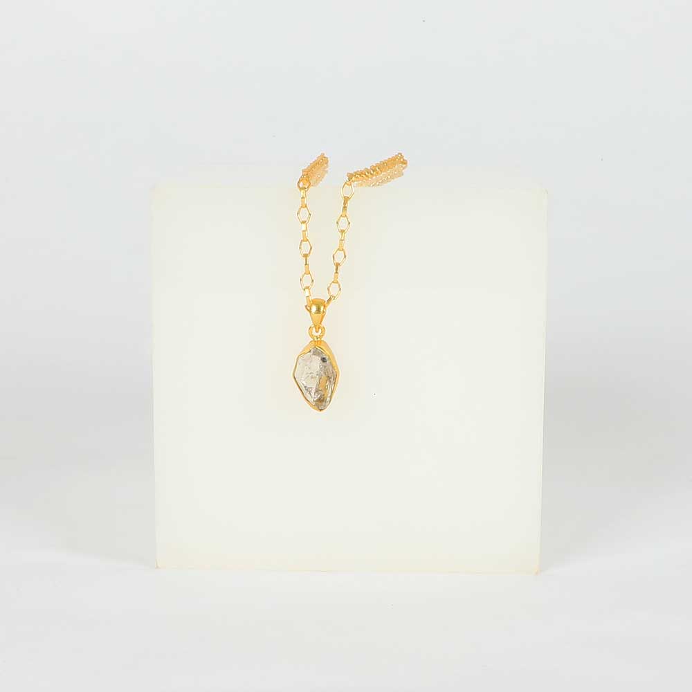 Herkimer diamond necklace on white background