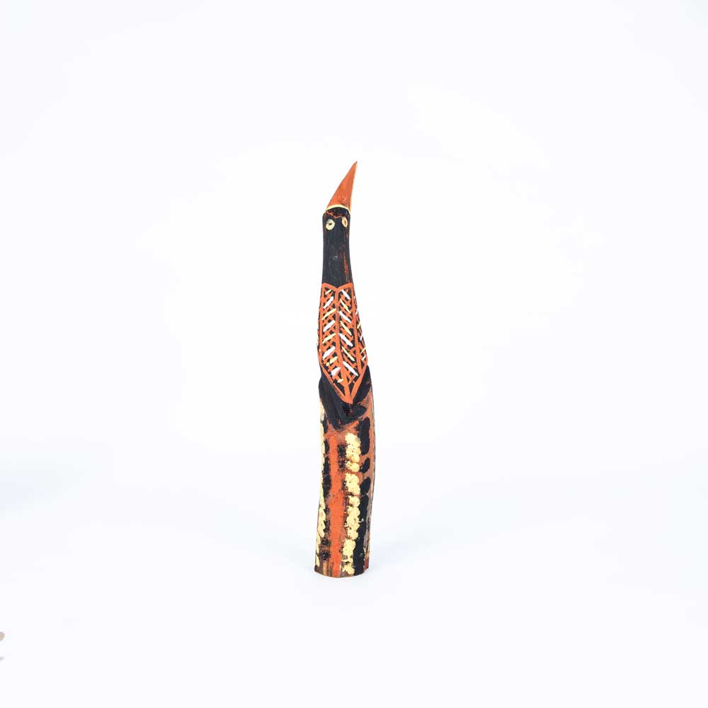 Elegant and shapely Black Cormorant Sculpture, hand carved and painted by John Babui photographed on white background