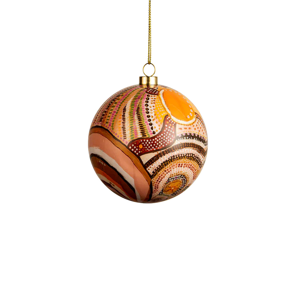Journeys in the sun decorative bauble on white background