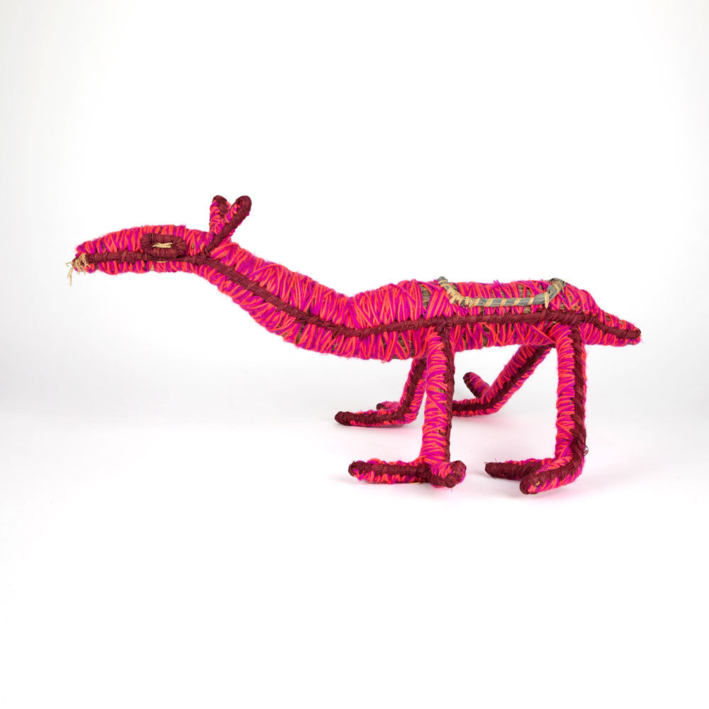 Kamula Camel  Sculpture by Tjanpi Weavers artist Justine Anderson on white background