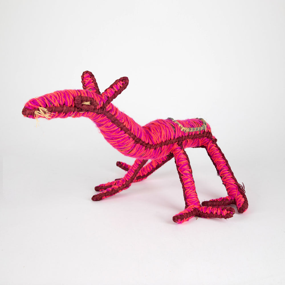 Kamula Camel  Sculpture by Tjanpi Weavers artist Justine Anderson on white background