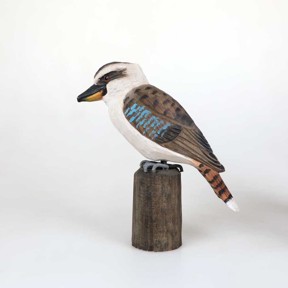 Kookaburra hand carved linden wood deco bird photographed against white background. Australian Museum Shop online
