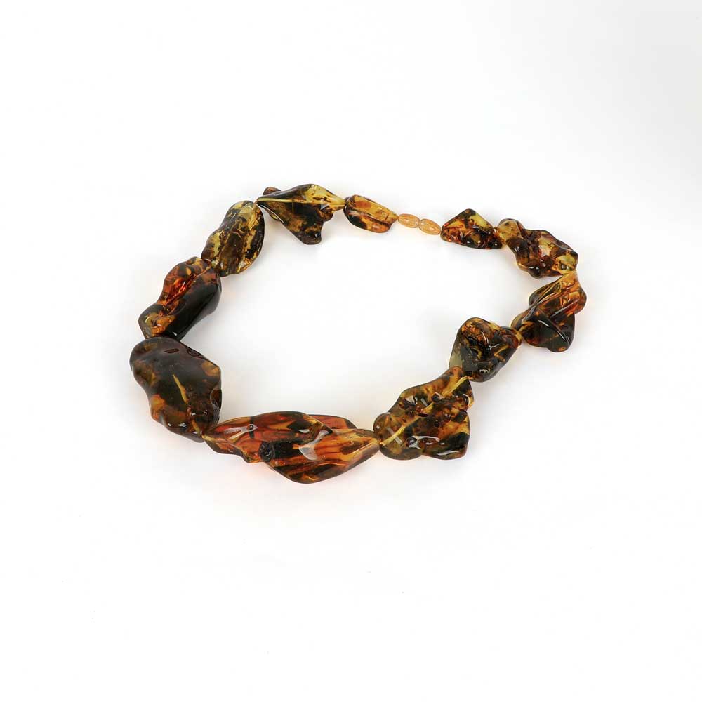 Large Abstract Natural Baltic Amber Bead Necklace on white background