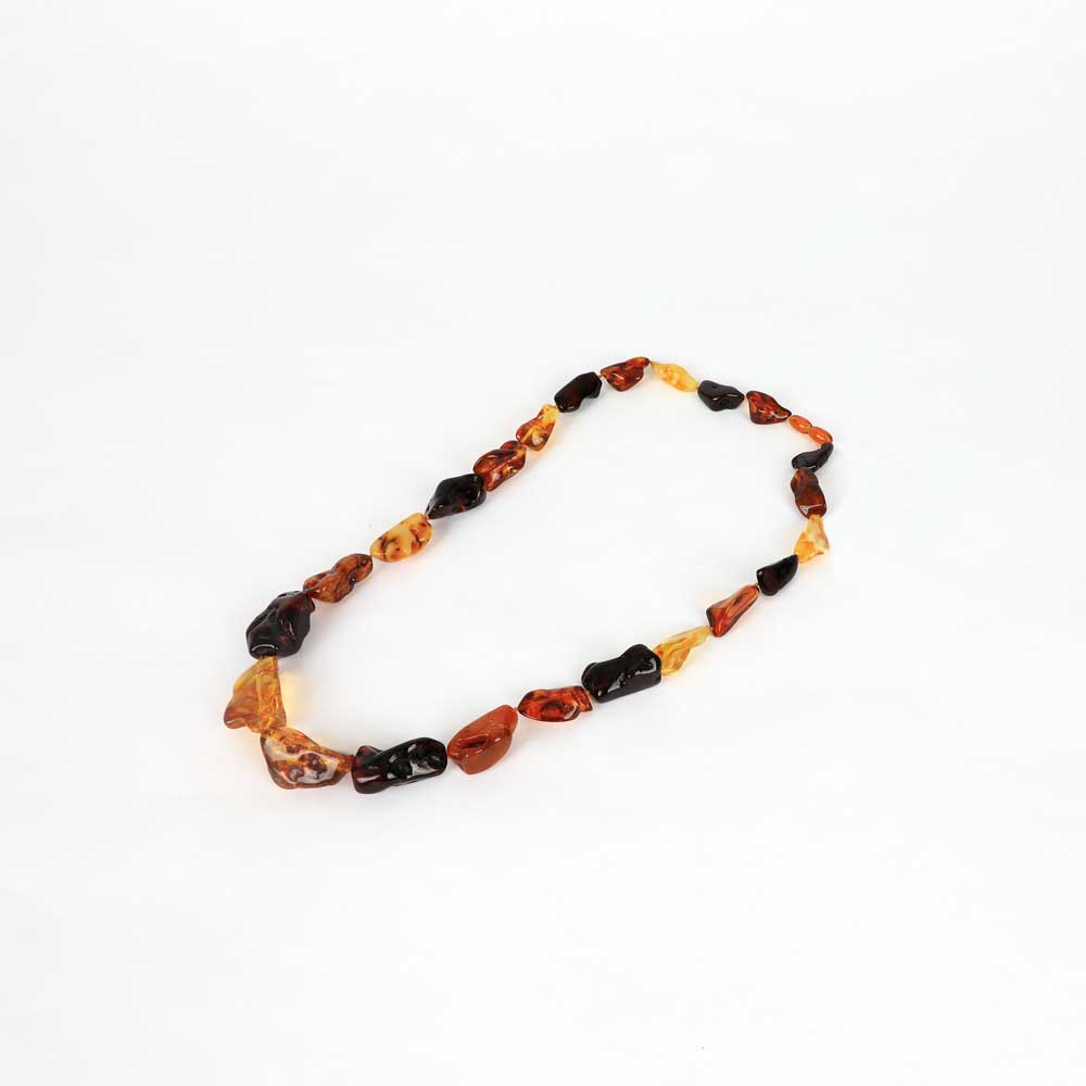 Large Multicoloured Abstract Amber Bead Necklace on white background