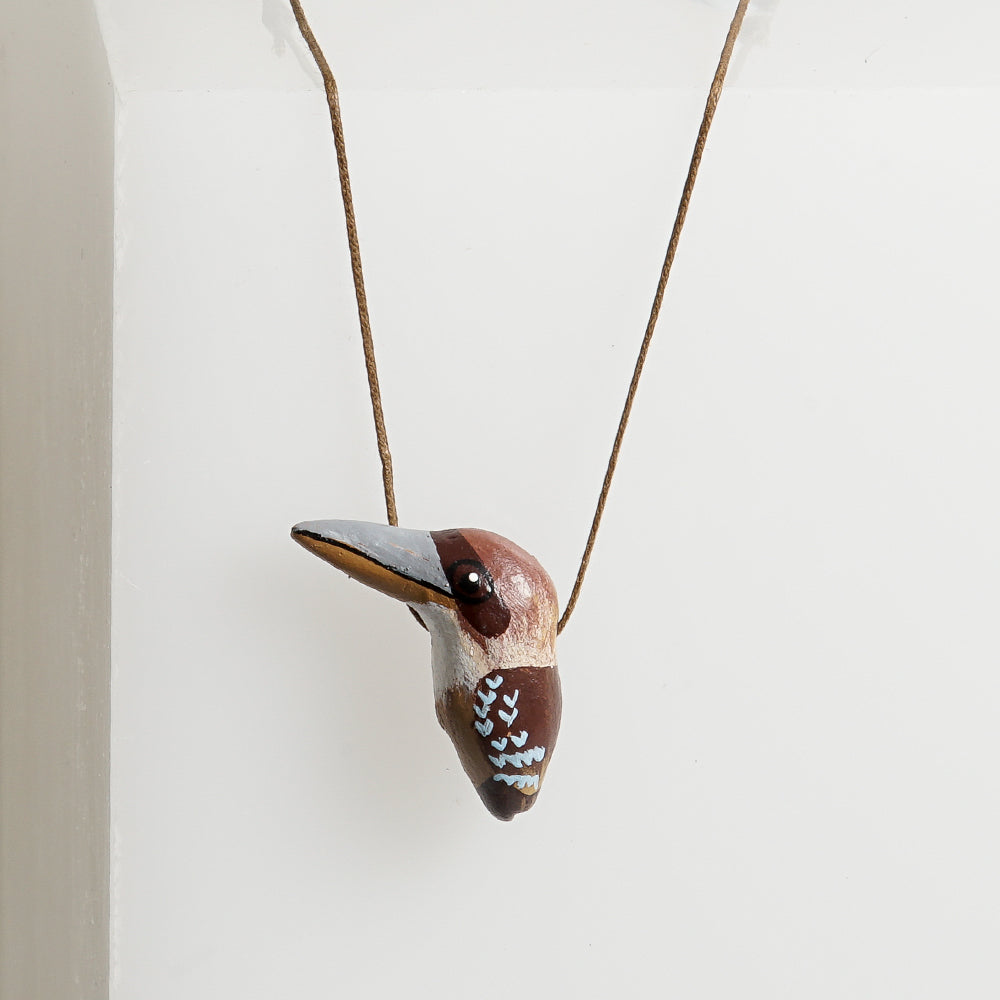 Bird Whistle Necklace hand made hand painted on white background