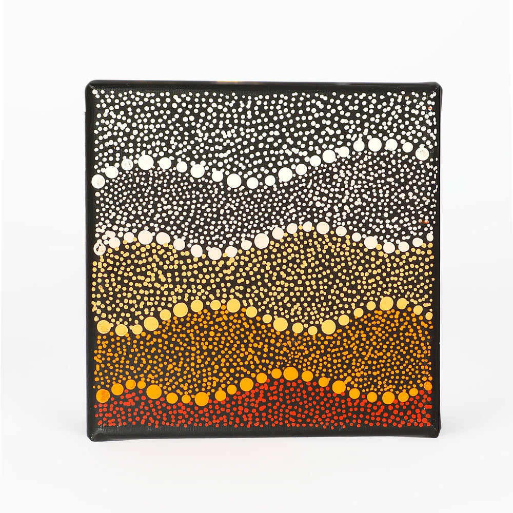 Handpainted canvas from Warlukurlangu Artists Cooperative on white background