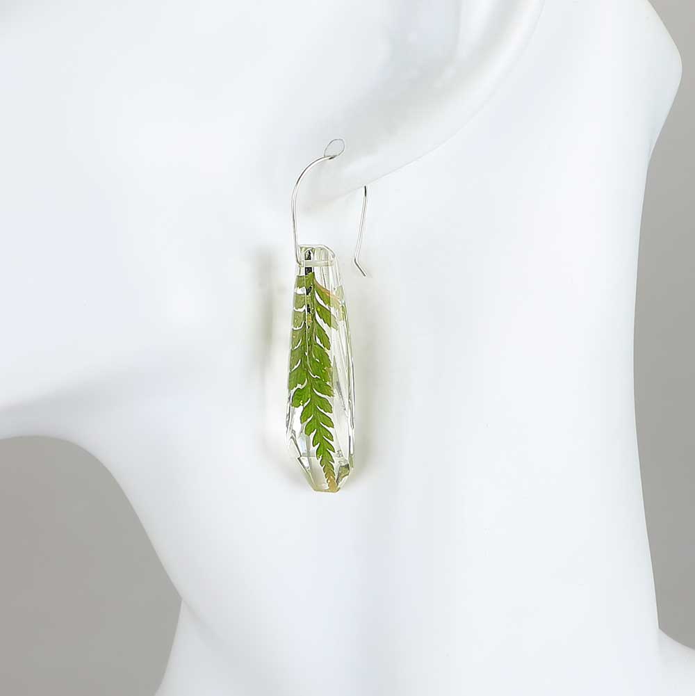 Fern  facetted dangle earrings on white background for Australian Museum Shop online