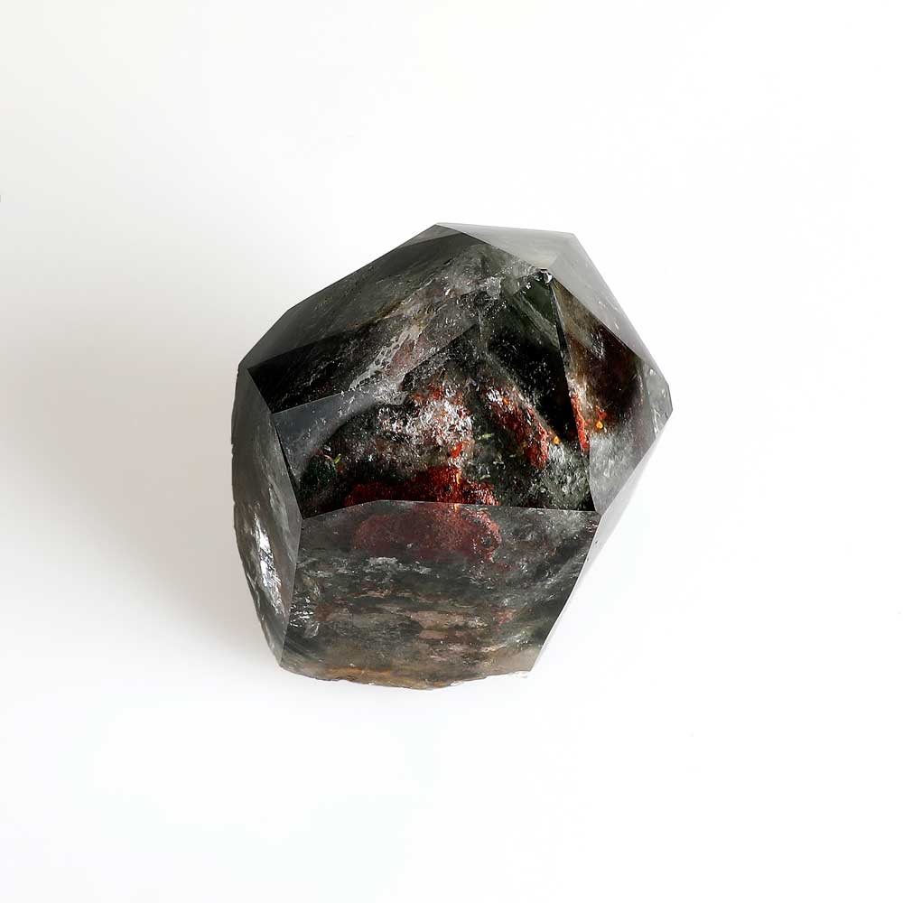 Lodalite polished quartz specimen photographed on white background. australian Museum shop online