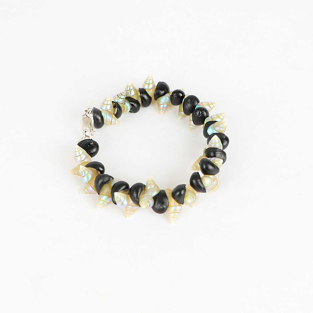 Black Crow and Maireener Shell Bracelet by Jeanette James on white background