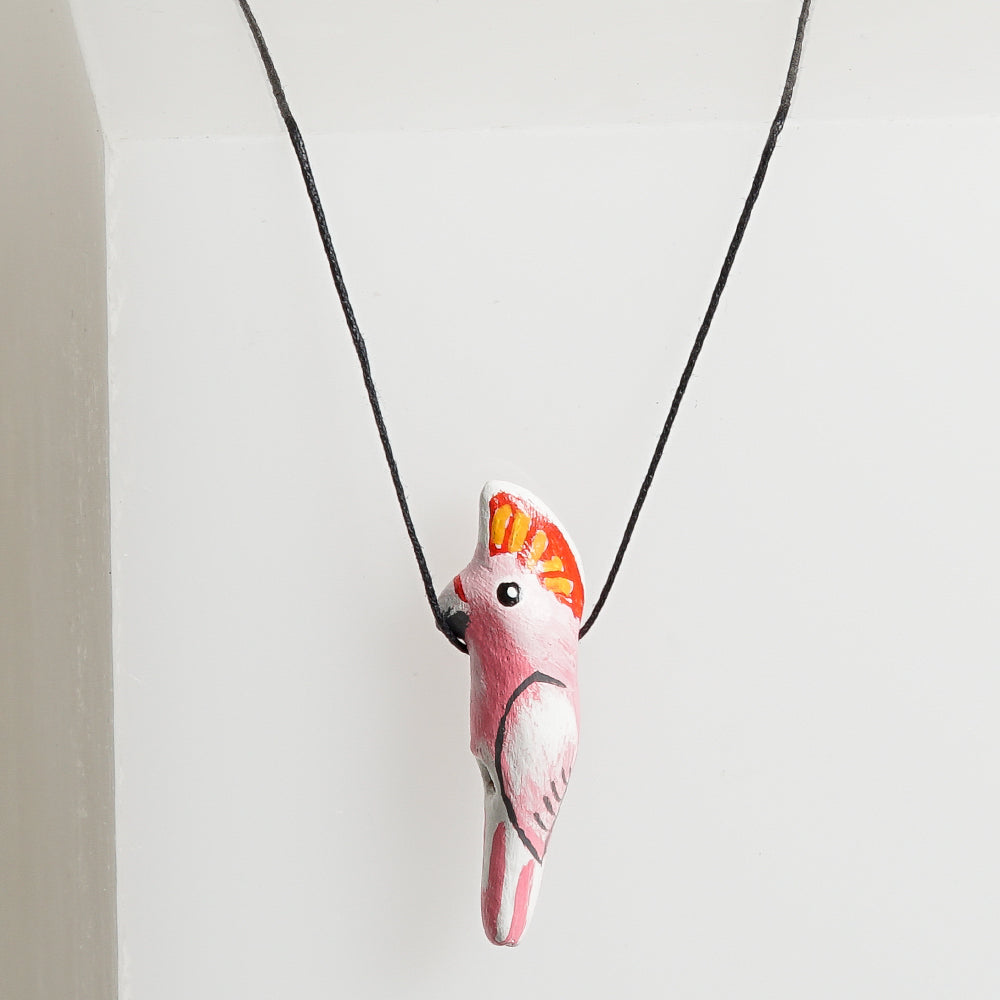 Bird Whistle Necklace hand made hand painted on white background