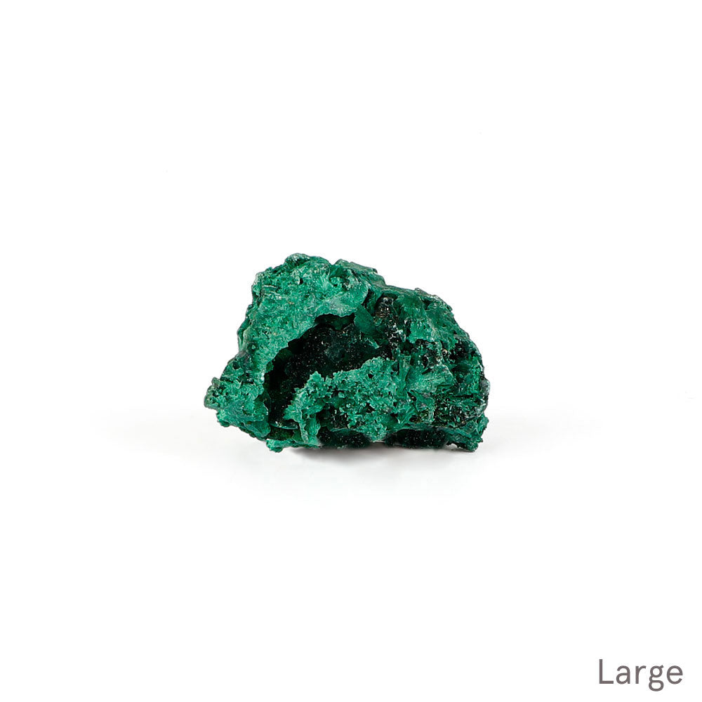 Malachite fibrous crystalline mineral specimen on a white background