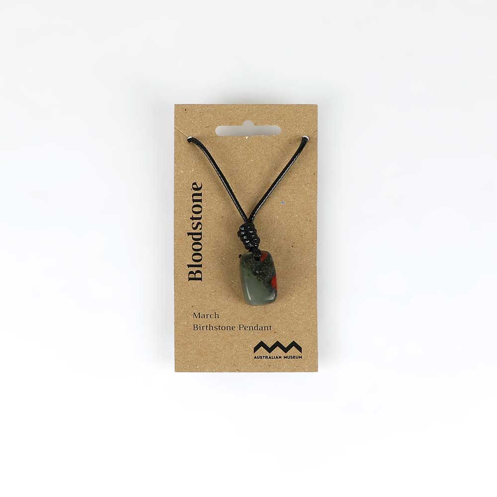 March birthstone pendant on leather and fibre necklace on white background for Australian Museum Shop online